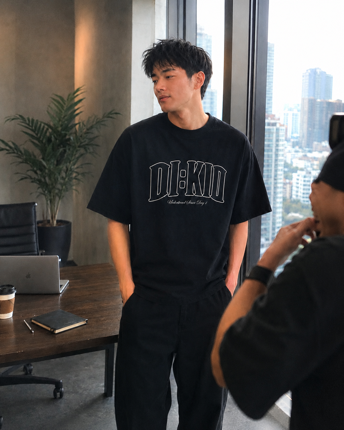 Model in the tee, office setting